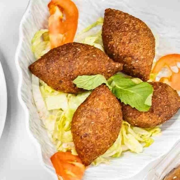 Crispy Falafel Platter with hummus and pita bread at Shawarmero Calgary SE